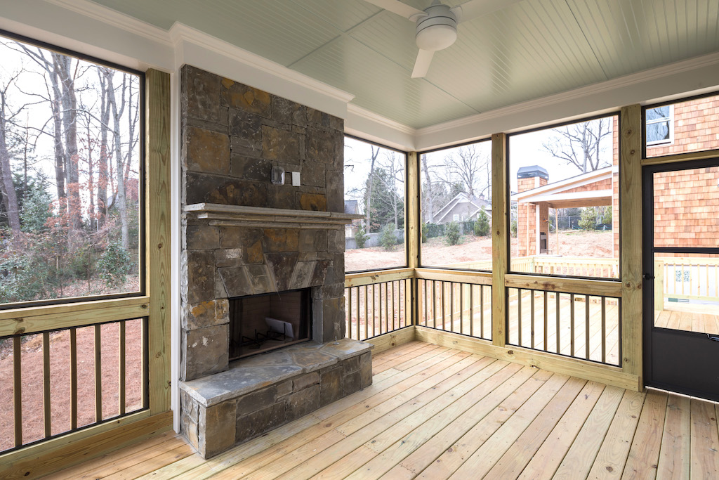 Cozy up to your new outdoor fireplace in a Rockhaven home