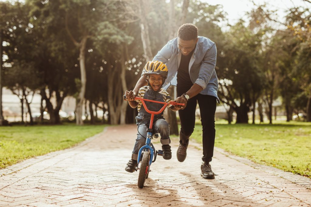 ® Jacob Lund Boy learning to ride bike