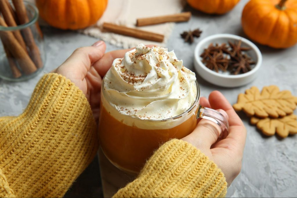 Pumpkin Spice Cup in Hands © New Africa